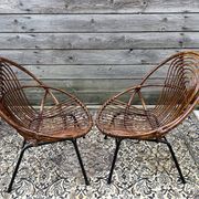 Paire de fauteuils en rotin, pieds métal CIRCA 1950