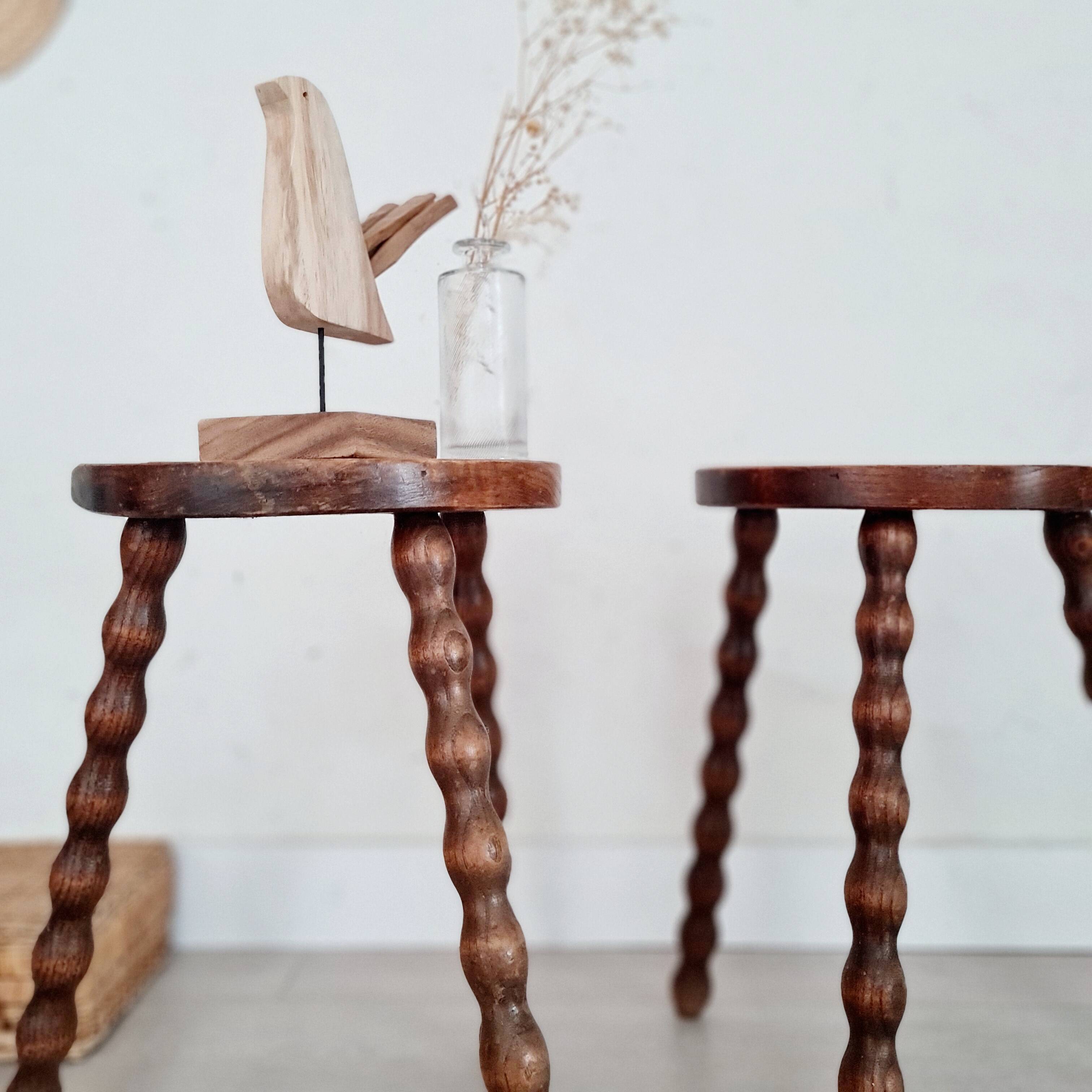Pair of old wooden tripod stools