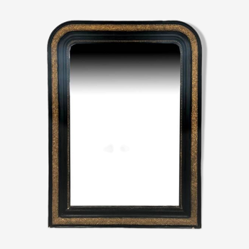 Miroir Napoléon III cintré, cadre en bois stuqué noir et or