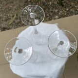 Set of 3 engraved champagne flutes.