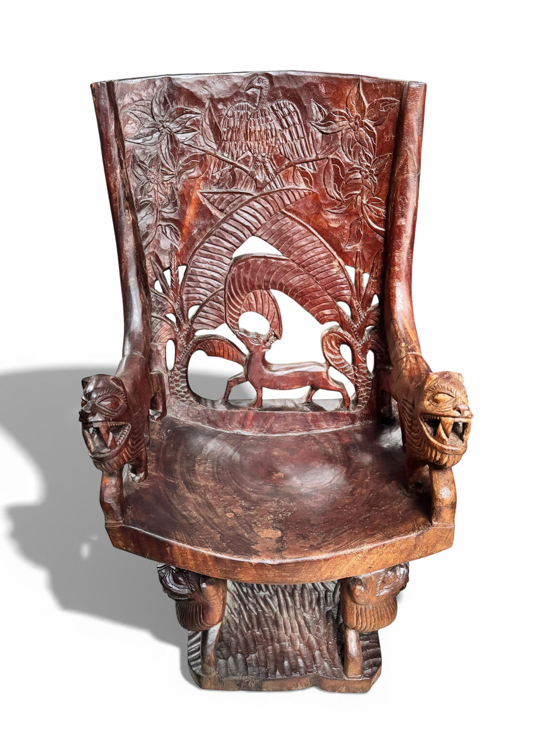 Pair of carved African armchairs