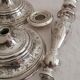 Pair of silver bronze torches, XIXth