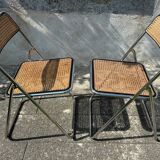 Pair of vintage metal caned folding chairs