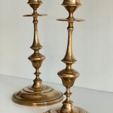 Pair of antique candle holders in solid brass
