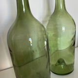Pair of large antique blown glass bottles