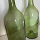 Pair of large antique blown glass bottles