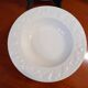 Set of 6 white ceramic deep plates made in Italy.