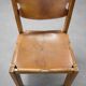 Set of 4 chairs from the 1960s in elm and patinated leather.