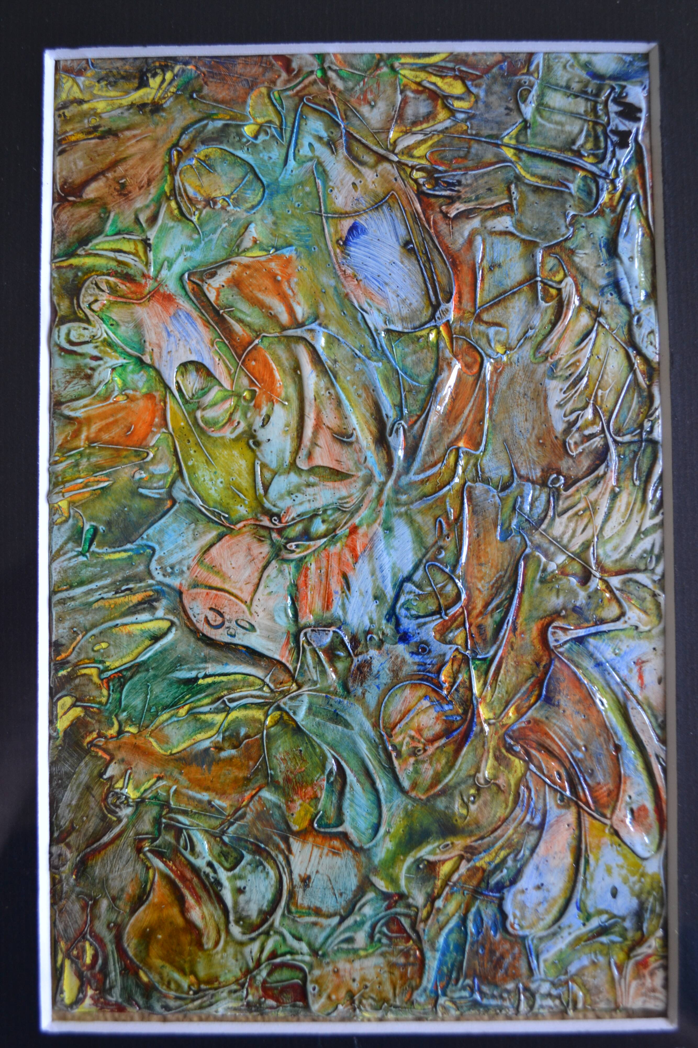 Framed abstract painting under glass