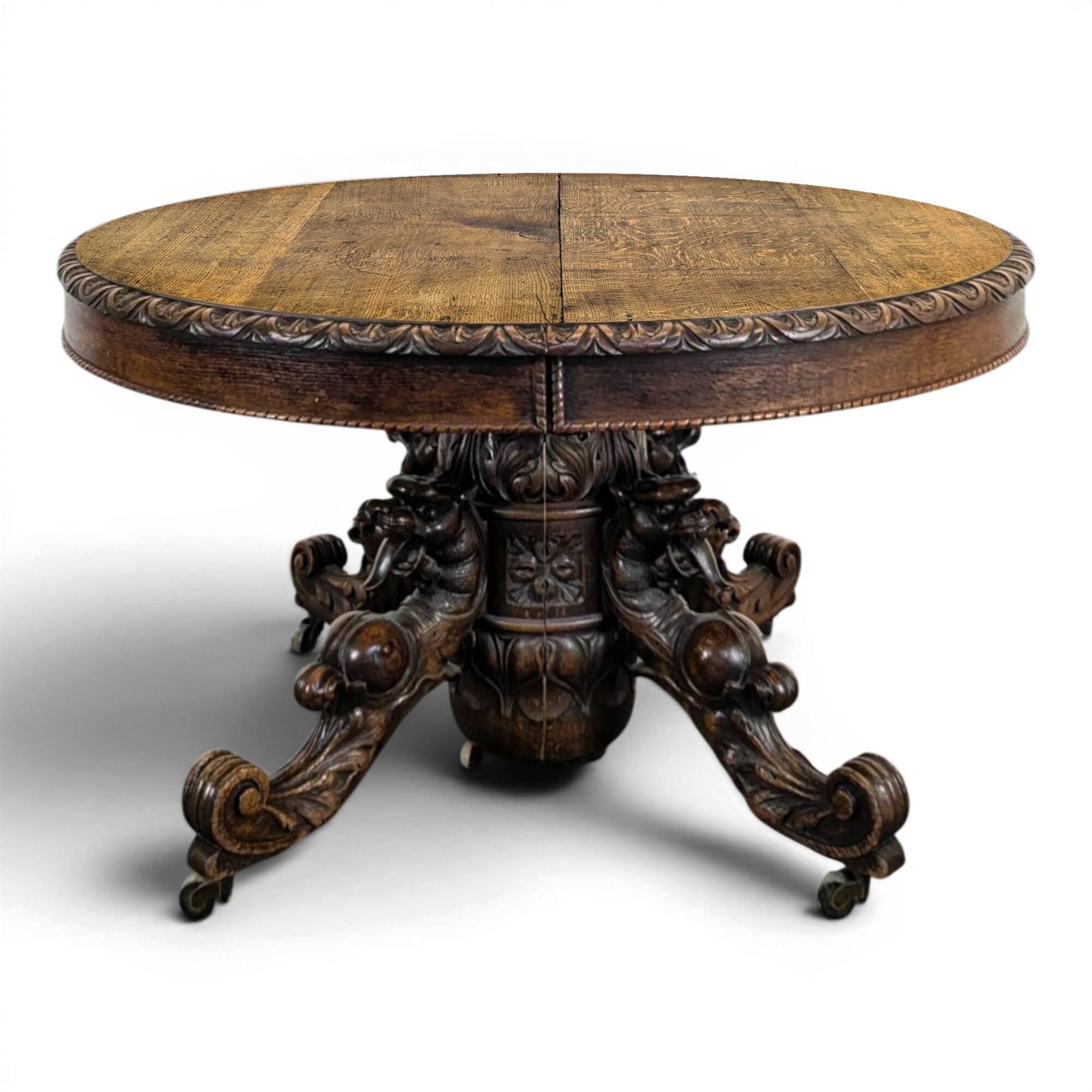 Renaissance-style gueridon with dragon heads in oak