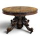 Renaissance-style gueridon with dragon heads in oak