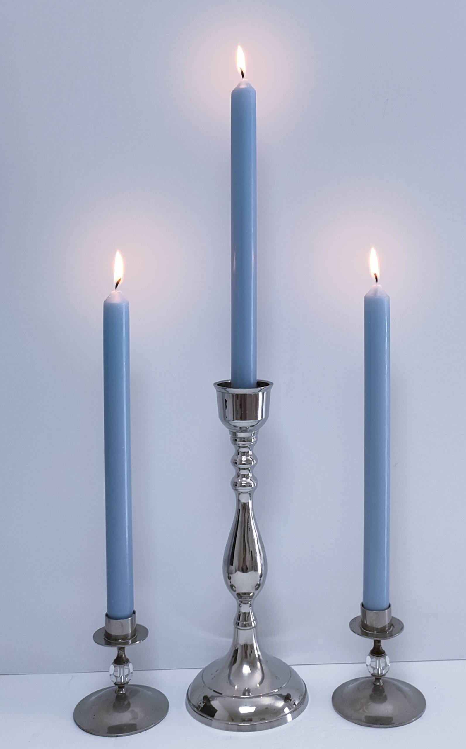 Three vintage metal chrome glass candlesticks