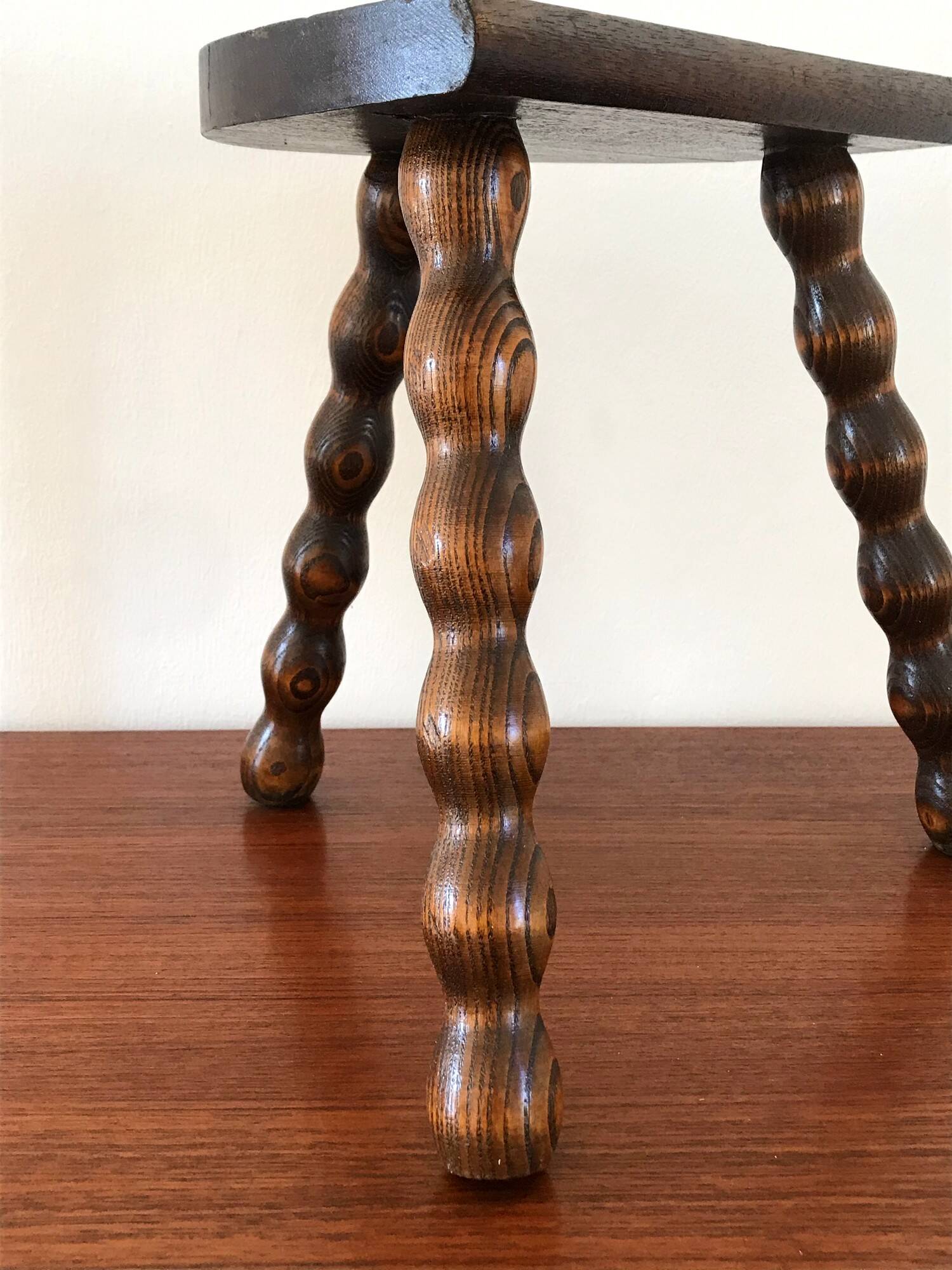Vintage solid wood tripod stool from the 70s