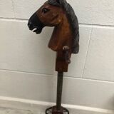 Wooden horse on stick