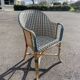 Old vintage woven and rattan wicker armchair 1930