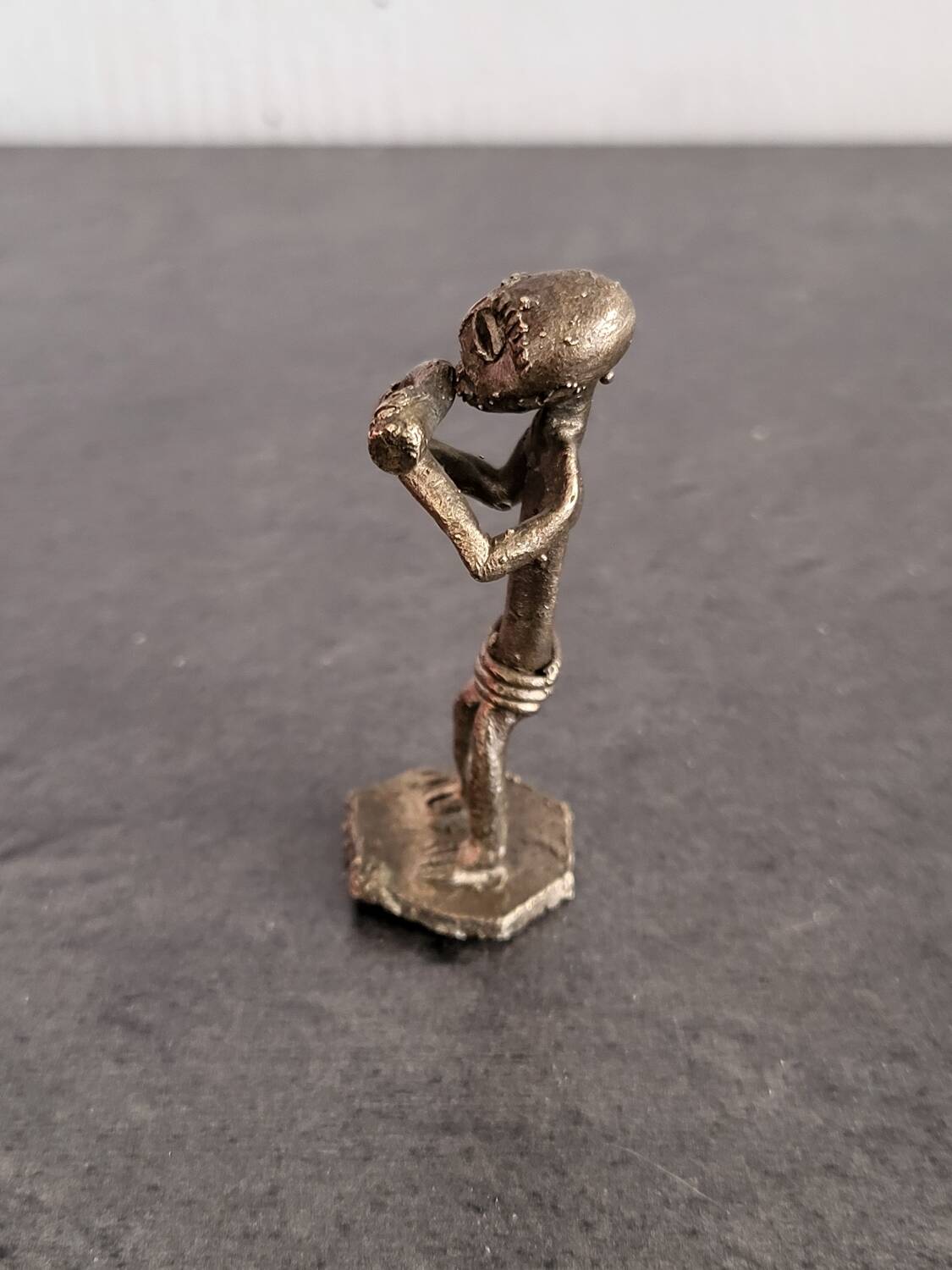 Ancient Akan weight for weighing gold in brass, in excellent condition.