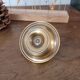 Round brass candlestick