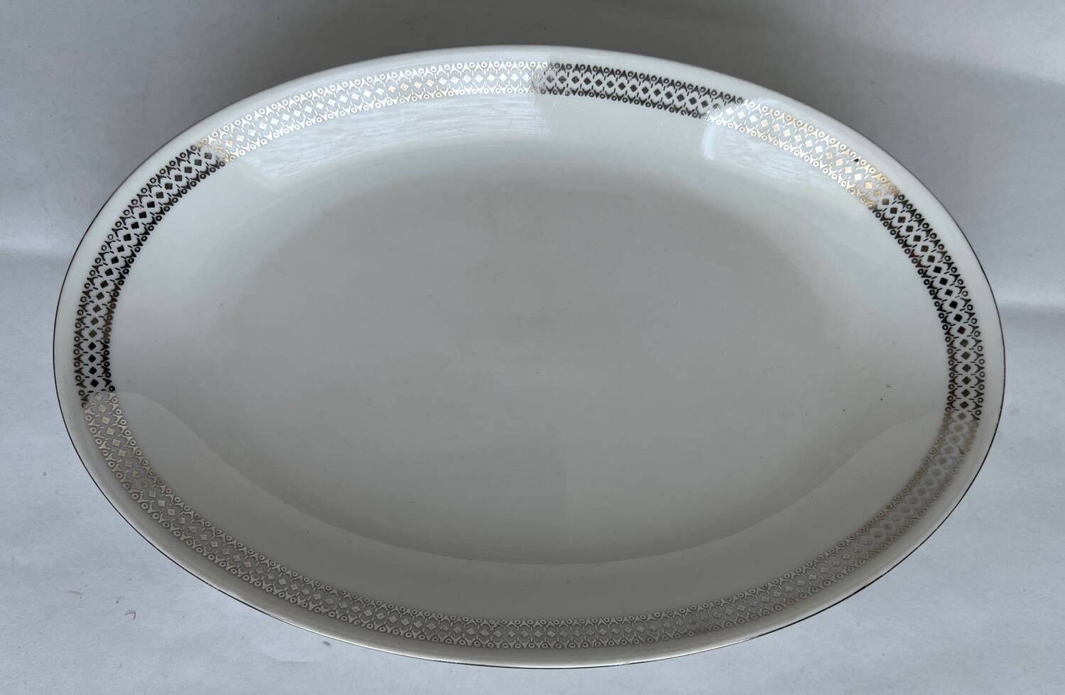 4 oval white porcelain dishes