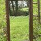 Rustic mirror called brutalist, molded carved natural wood
