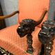 Pair of Louis XIII style armchairs in carved walnut circa 1850