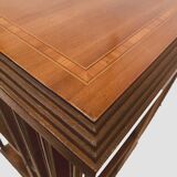 Mahogany revolving bookcase with inlaid top 20th century