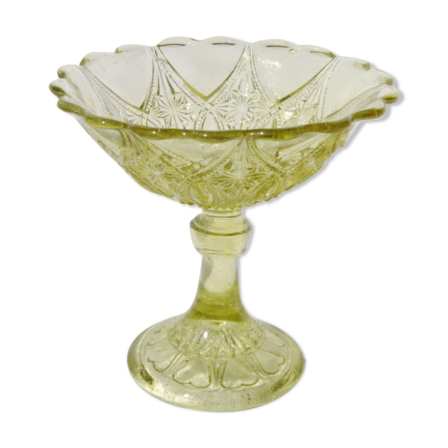 Old small cut on foot in yellow molded glass