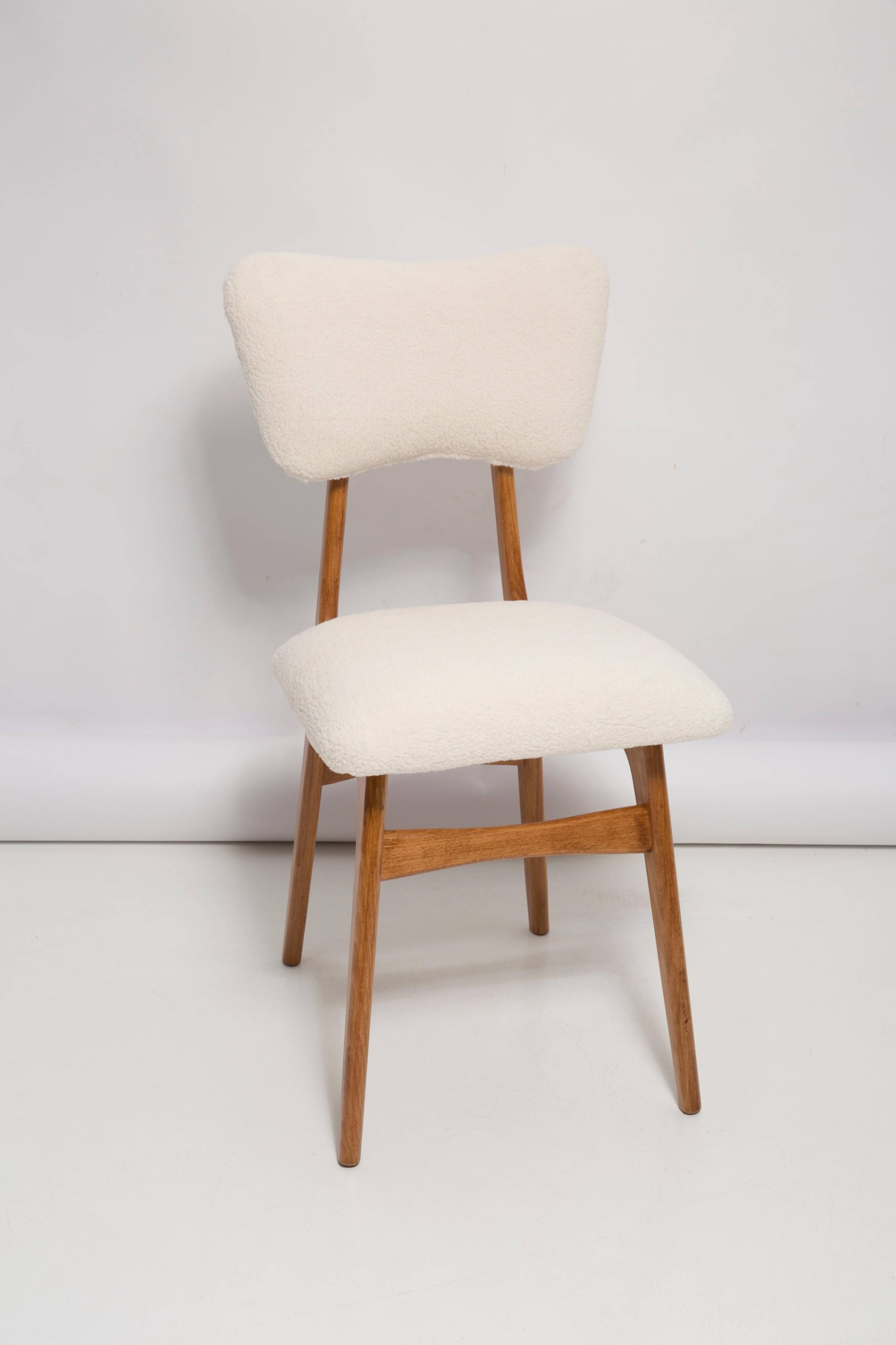 Butterfly chair in beech wood and cream boucle, Europe, 1960