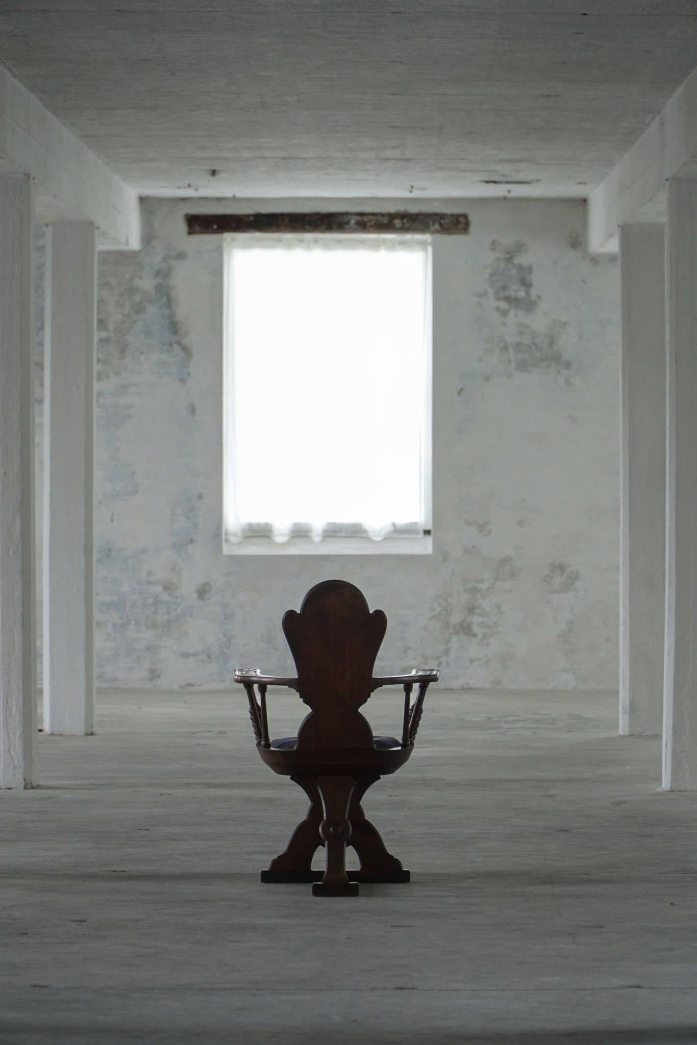 Scandinavian armchair in solid oak with cushion, folk art, early 19th century.