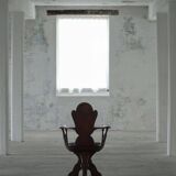 Scandinavian armchair in solid oak with cushion, folk art, early 19th century.