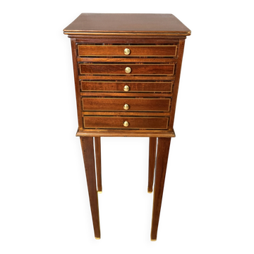 Louis XVI bedside table in mahogany with five drawers.