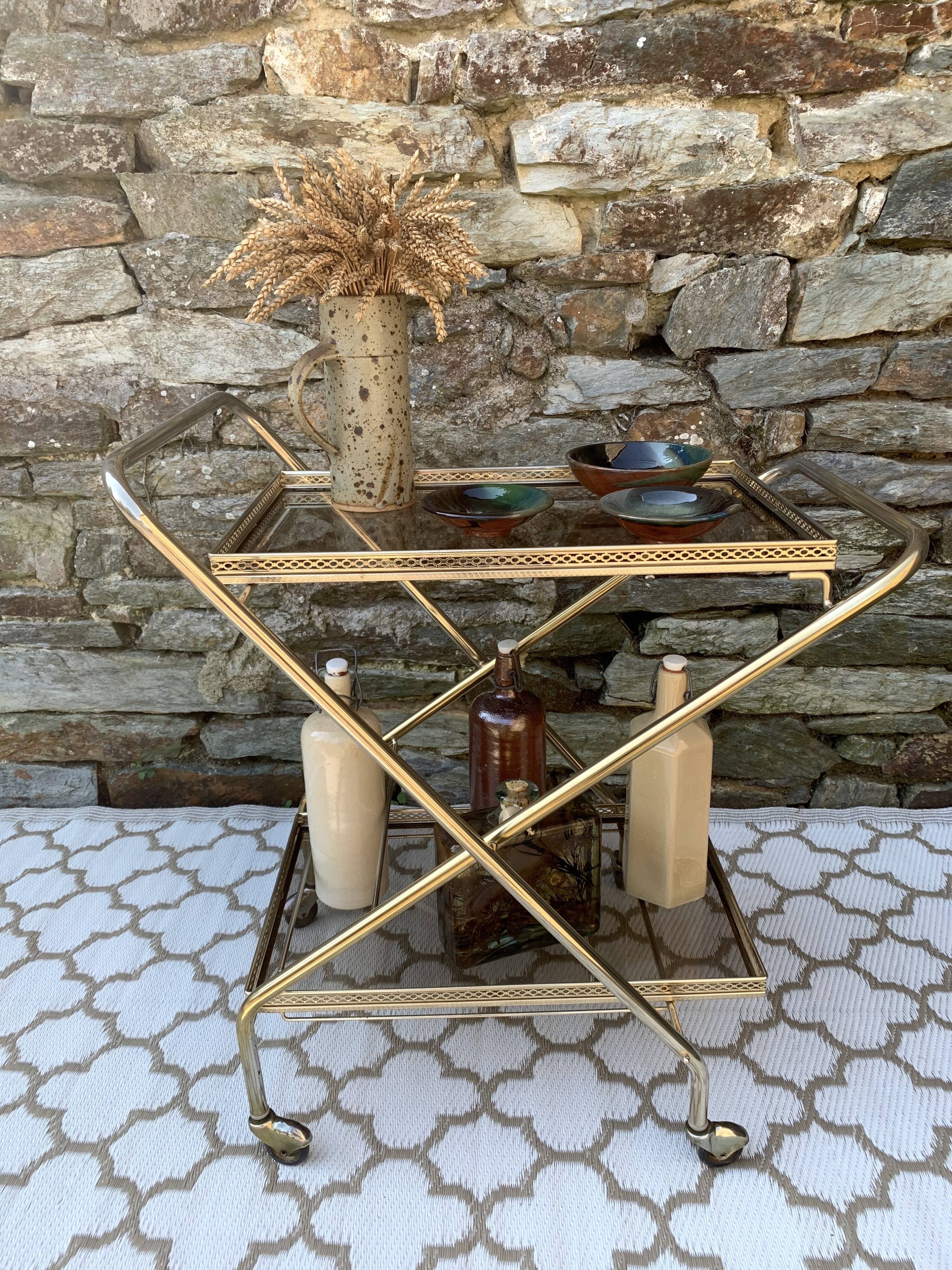 Golden dessert with wheeled glass tray
