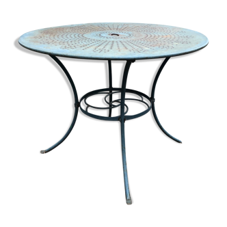 Green wrought-iron garden table round