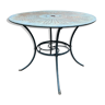 Green wrought-iron garden table round