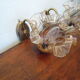 Wall lamps in gilded metal, verrine in the shape of amber glass corollas, 70s