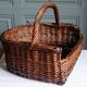 Handmade woven and dyed willow harvest basket.
