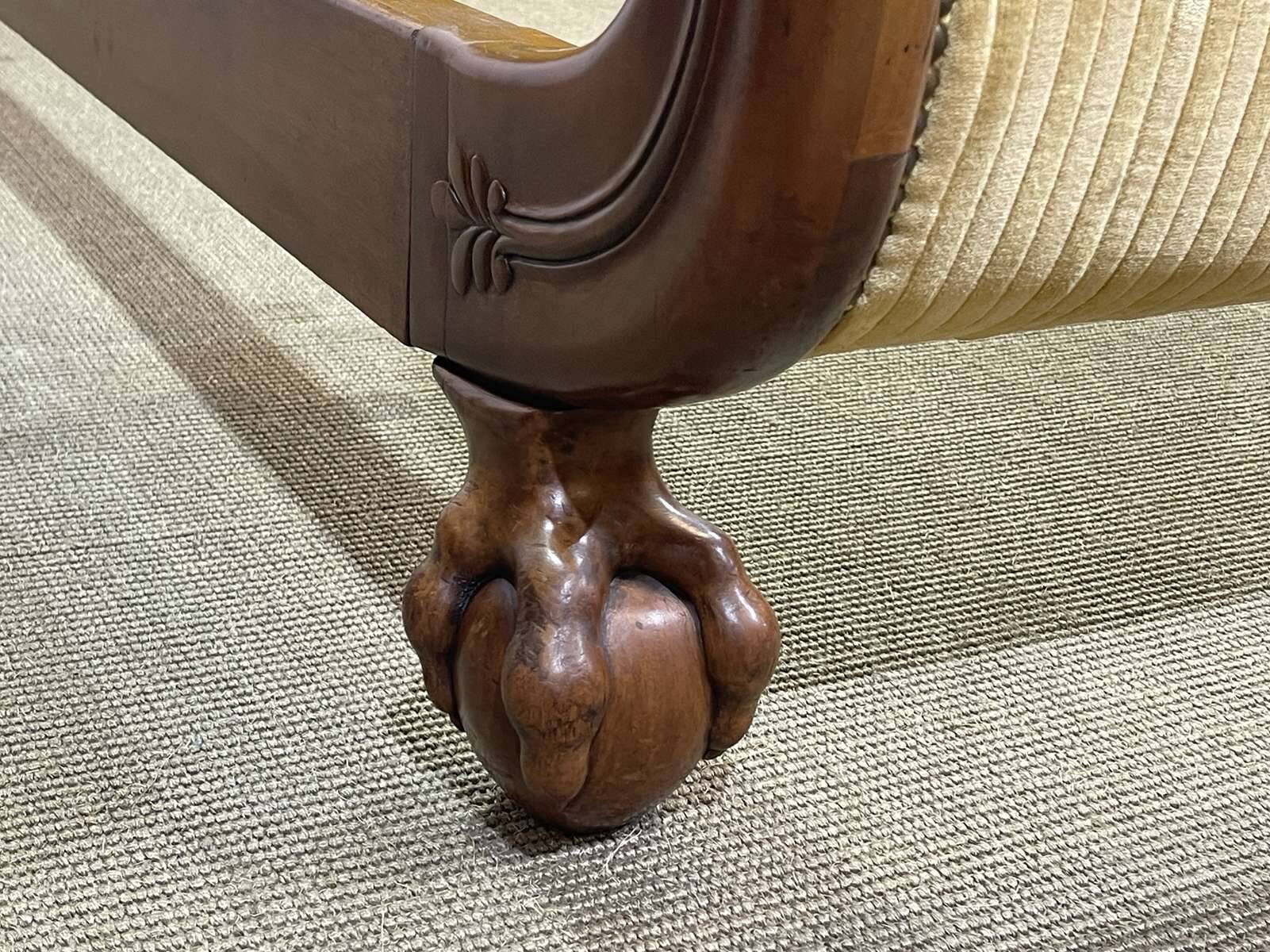 Early 19th century Empire mahogany bed with swan neck finials and claw feet