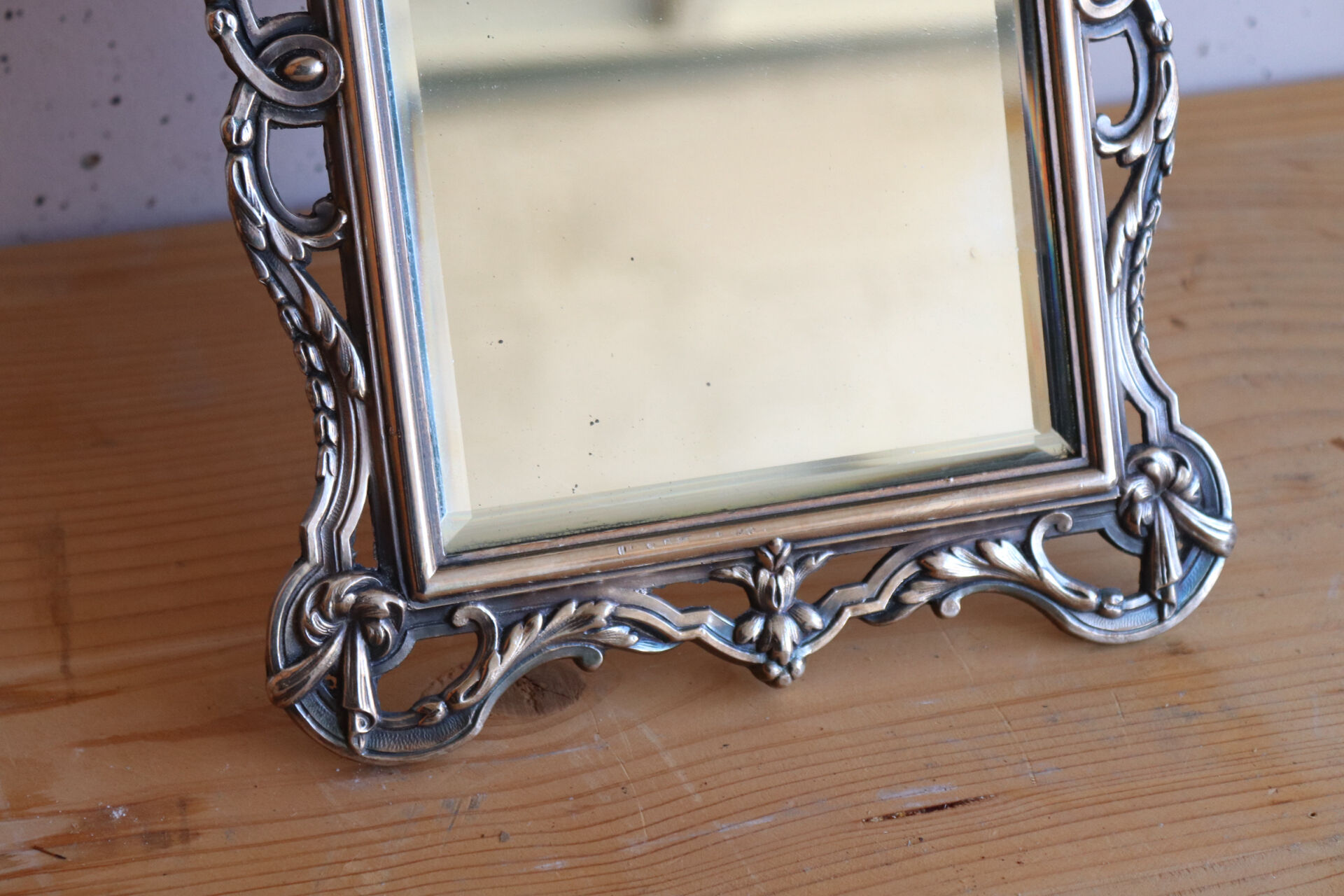 Small antique table mirror in Louis XVI style, silver-plated metal.