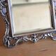 Small antique table mirror in Louis XVI style, silver-plated metal.