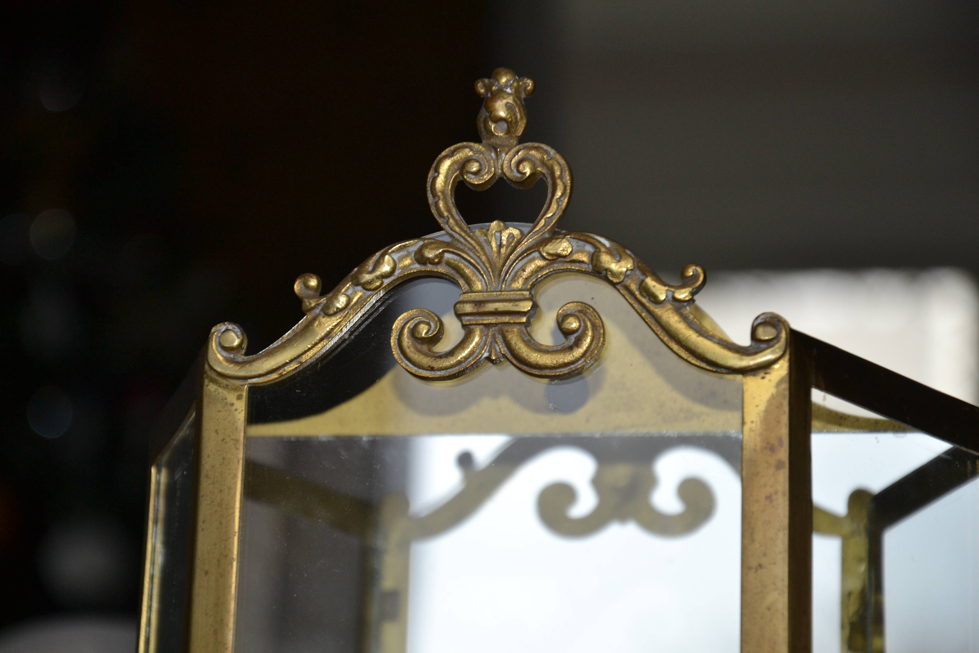 Antique glass wall light in brass