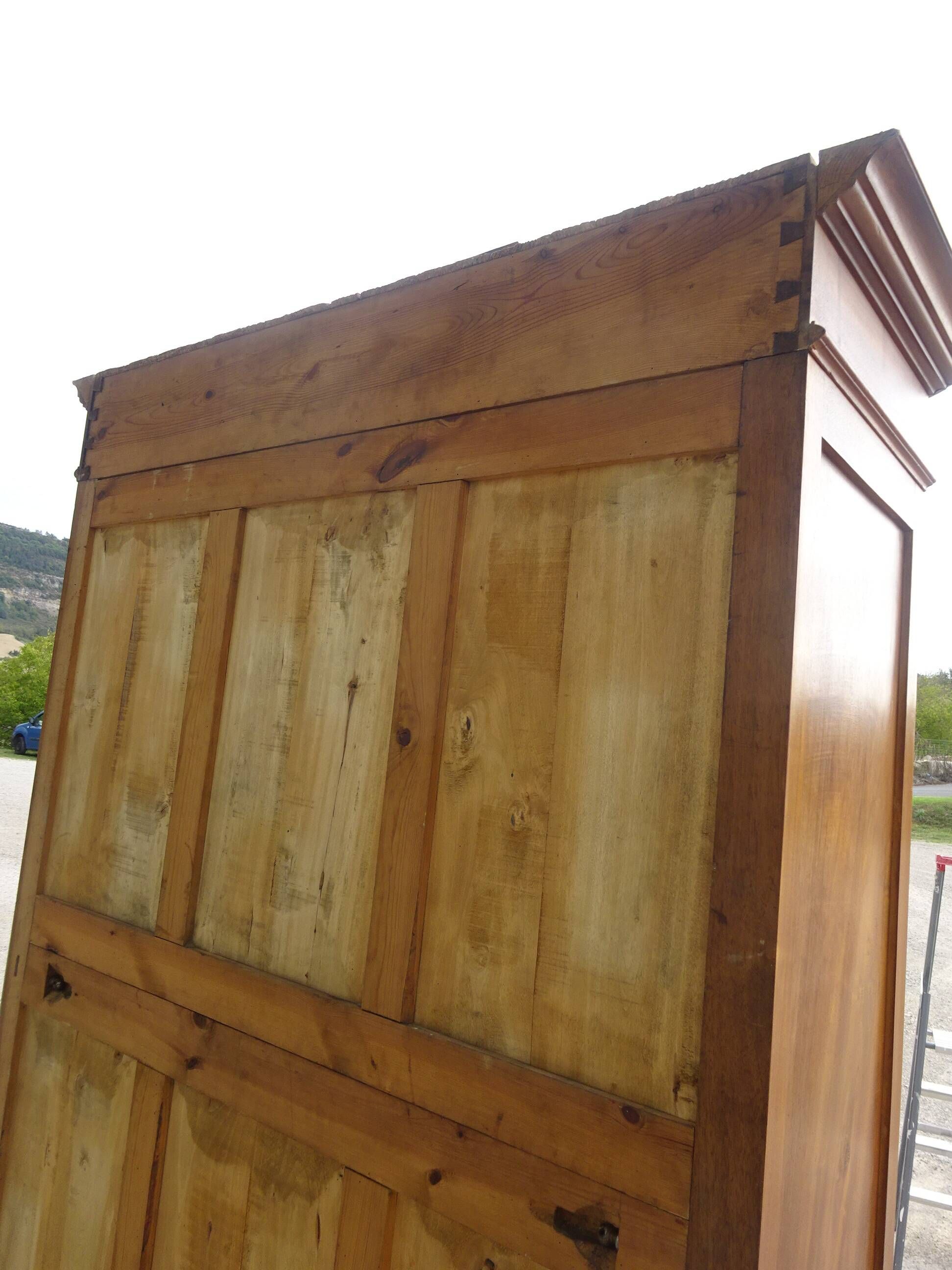 Large antique wardrobe in solid walnut