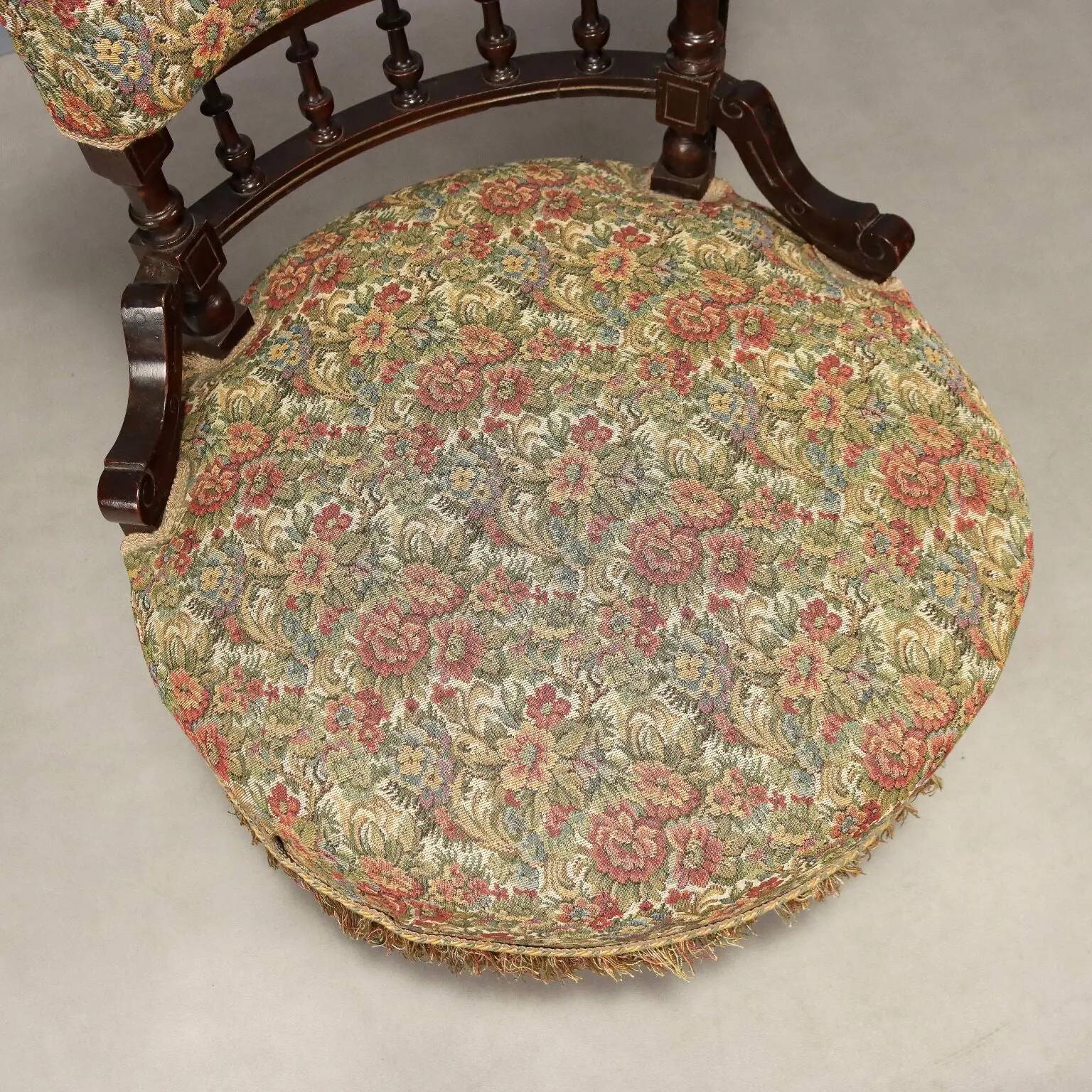Victorian armchair with fabric pouf, England, 19th century.