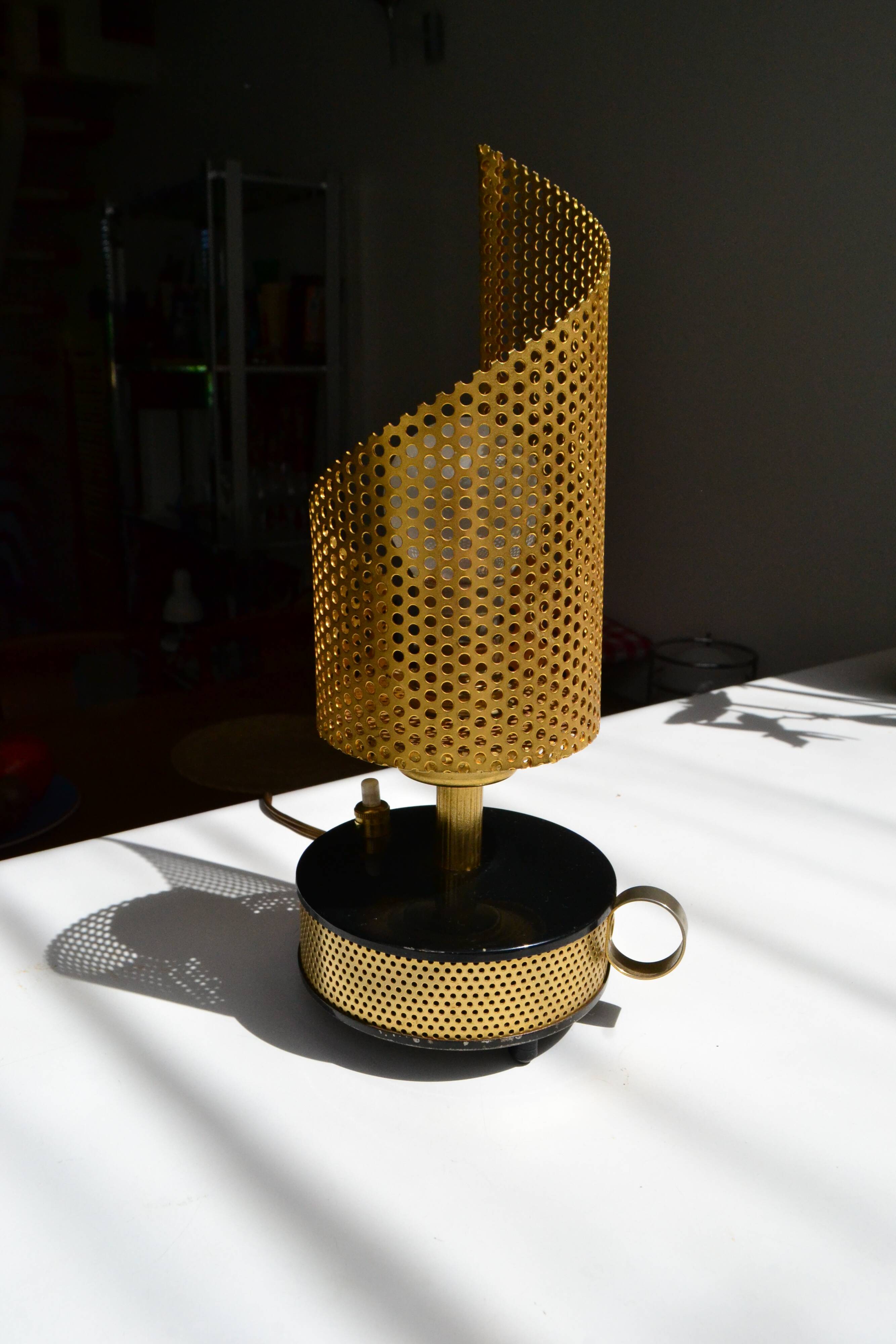 Perforated metal lamp with a 50s-style TV