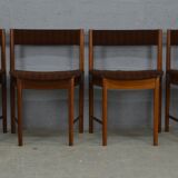 Round teak dinning table and chairs by Mctintosh