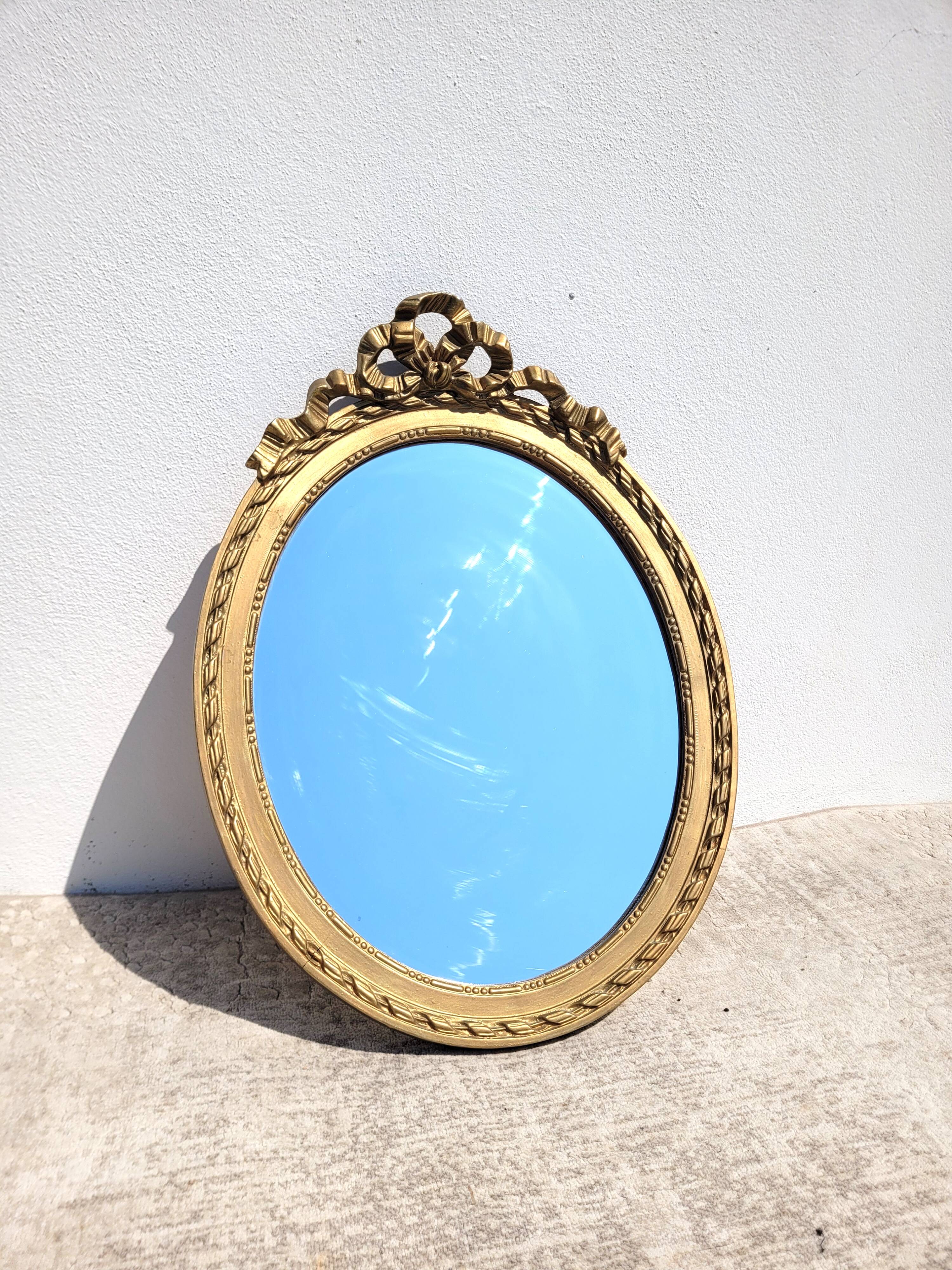 Large oval Louis XVI style mirror 47x65cm