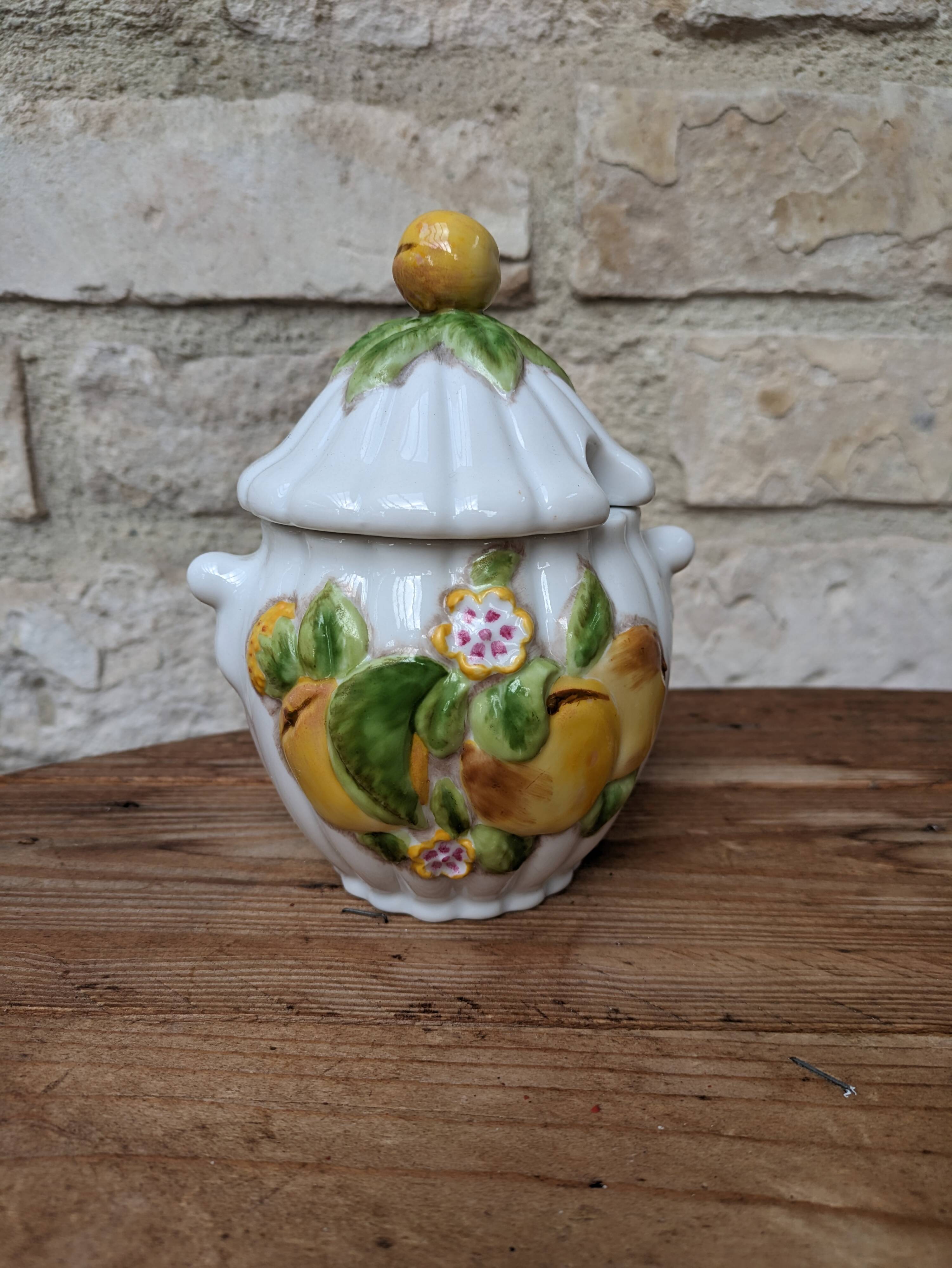 Old ceramic sugar bowl with yellow fruit motif