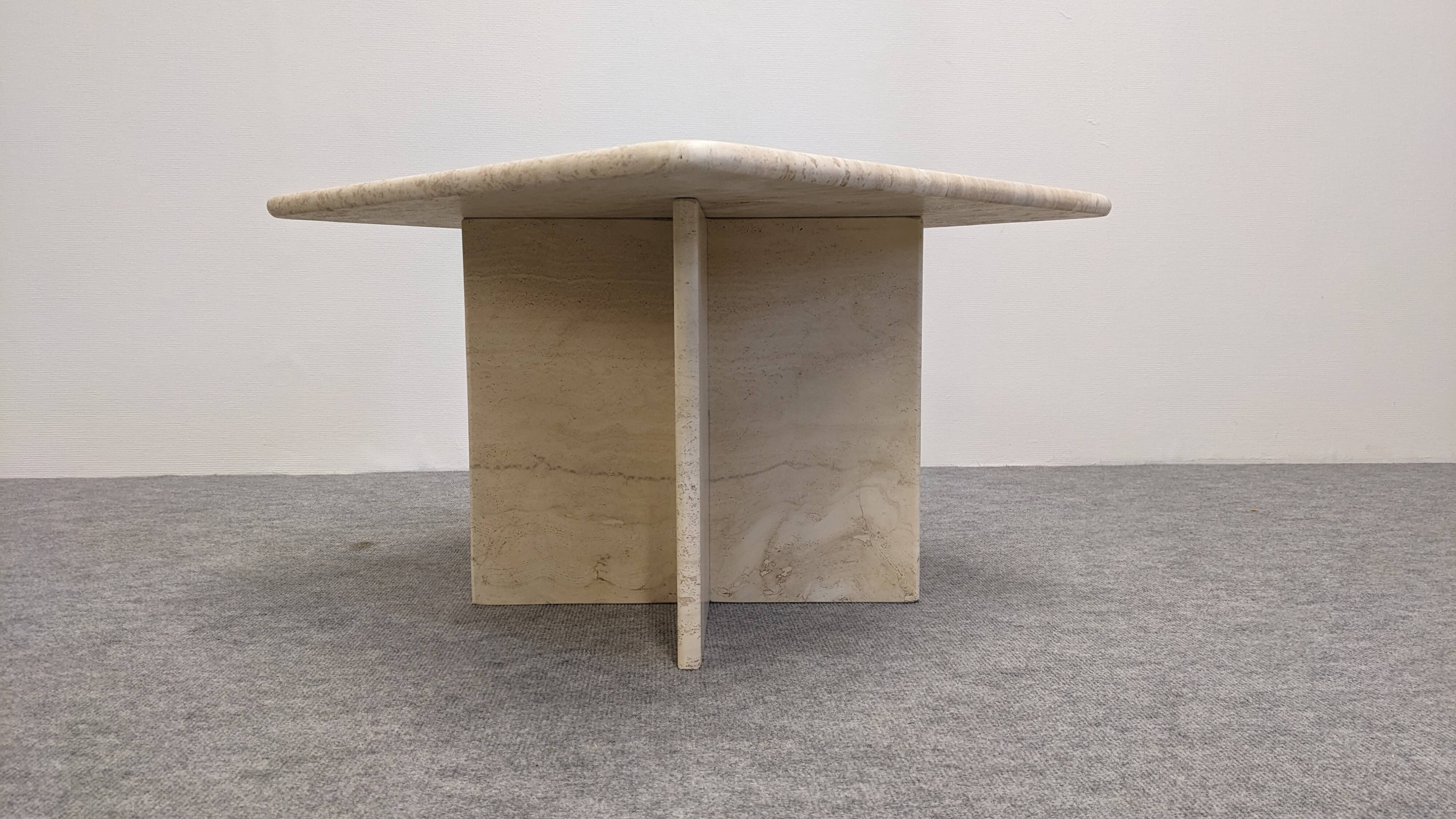 Coffee table or side table in travertine, Italy around 1970.
