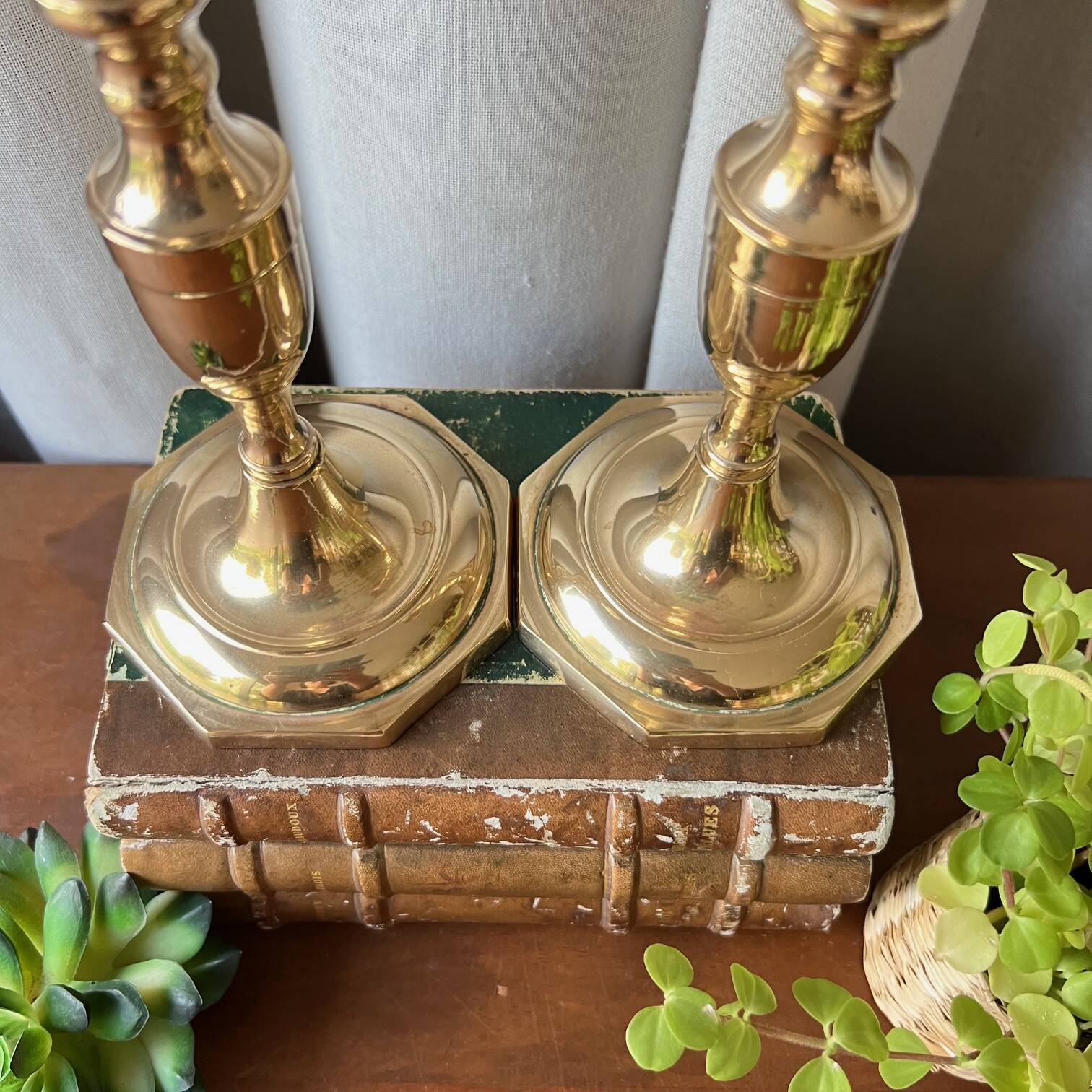 Duo of brass candlesticks
