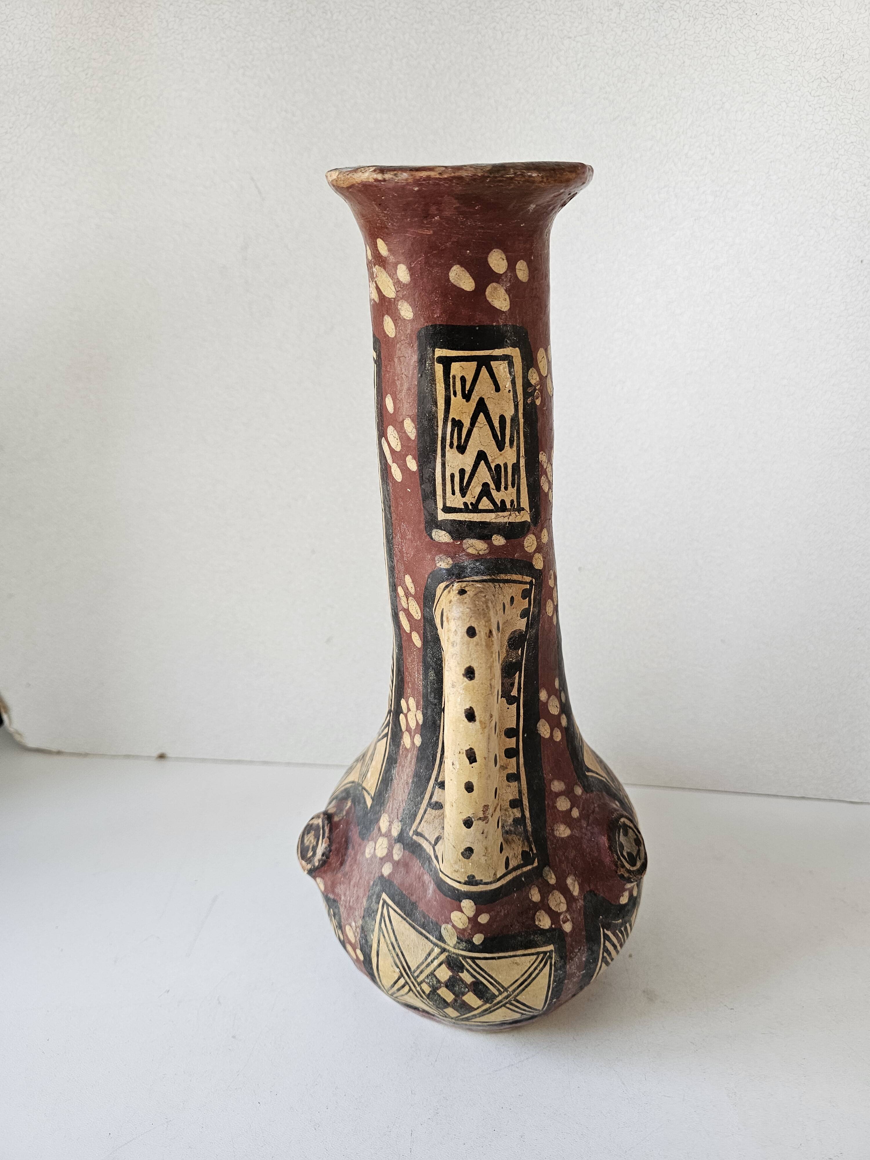 Antique Kabyle Algerian pottery vase with handle and polychrome geometric decorations