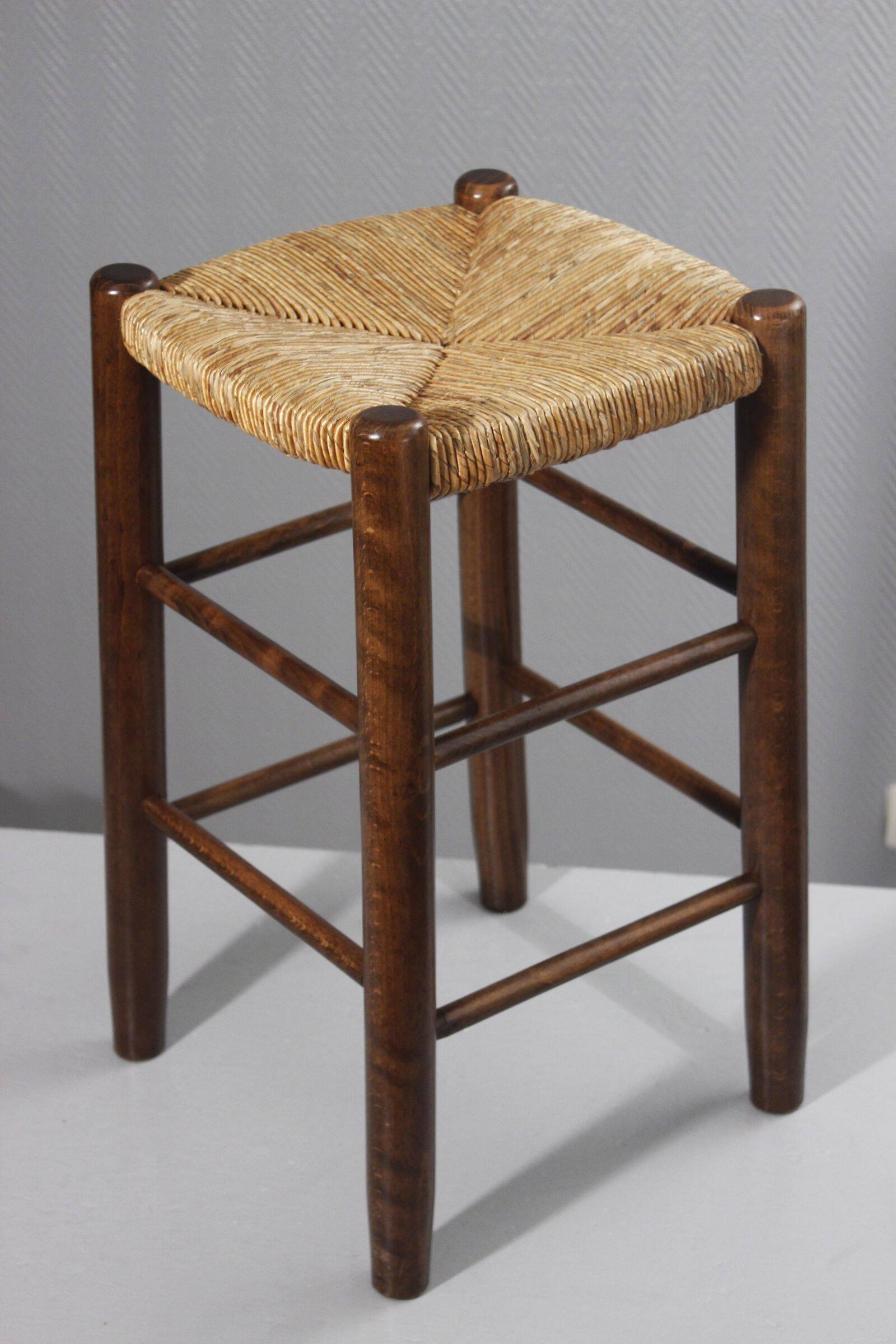 Vintage straw stool in the style of Charlotte Perriand, 1970s.