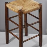 Vintage straw stool in the style of Charlotte Perriand, 1970s.
